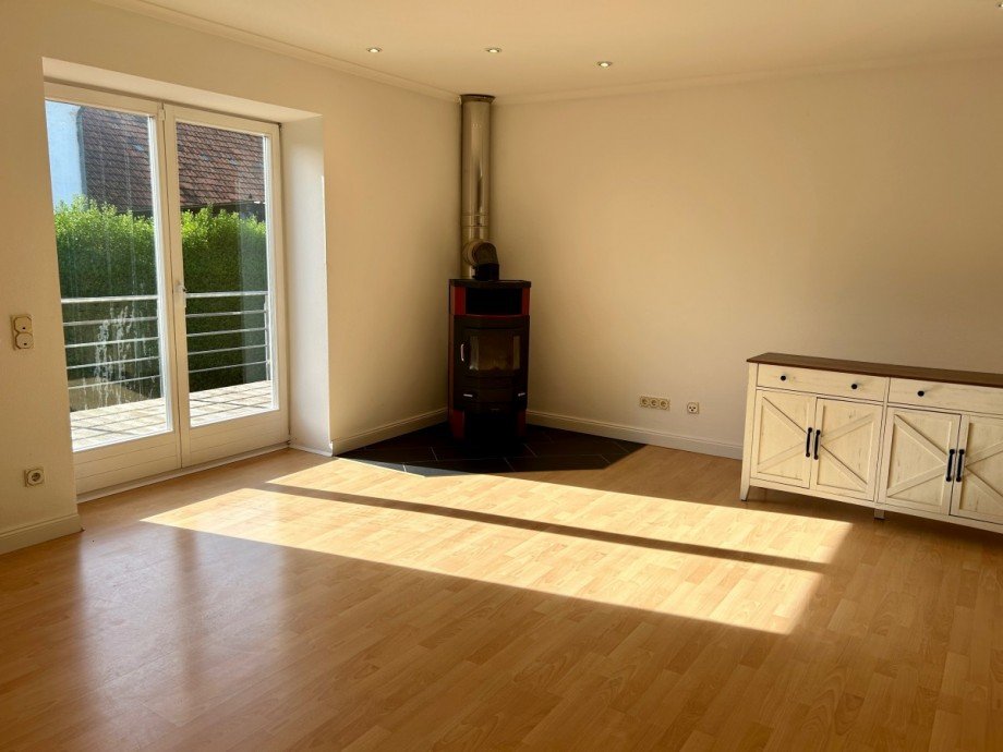 Wohnzimmer mit Kamin und Theke Bauernhaus Dockendorf